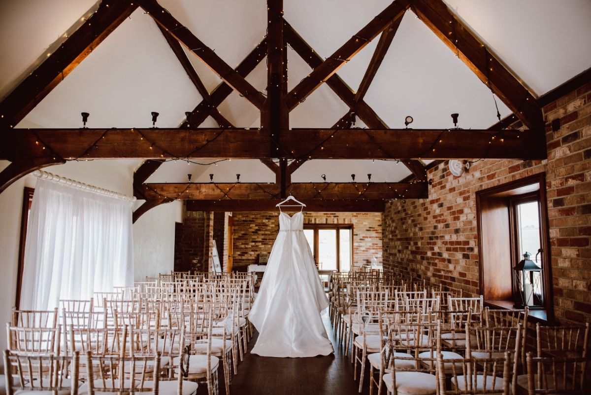 Daisy opted to keep the beautiful Cartshed neutral, utilising the fairy lights, wicker hearts and Love letters provided by the venue.