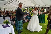Hand fasting tradition as part of the ceremony