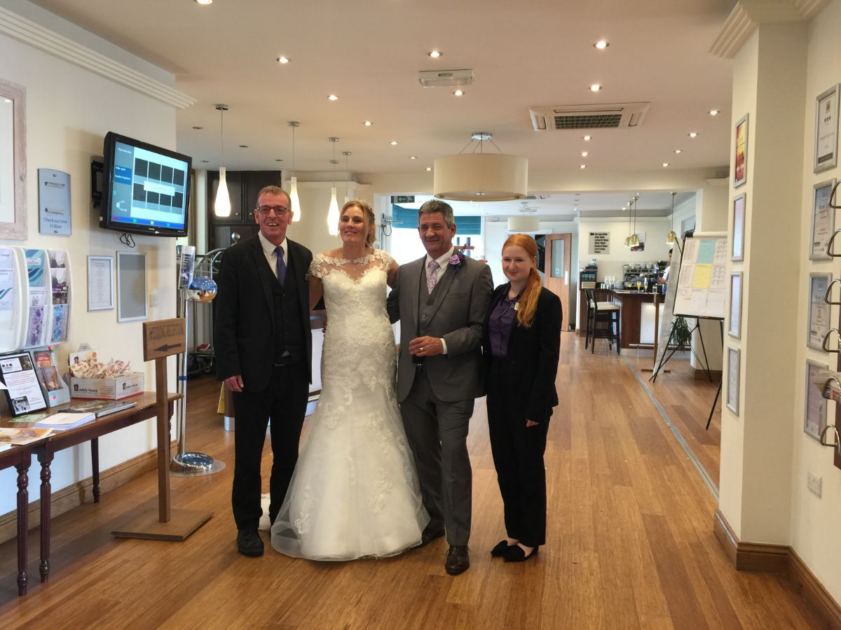 Graeme, Duty Manager with Kat Wedding Coordinator and the happy couple! 